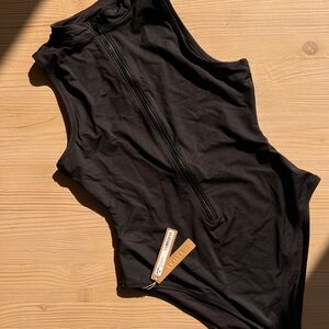Black SKIMS one piece swimsuit front zipper